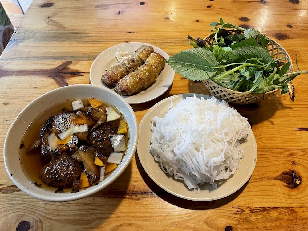 Bun Cha Ta on Nguyen Huu Huan Street serves authentic Hanoi flavors